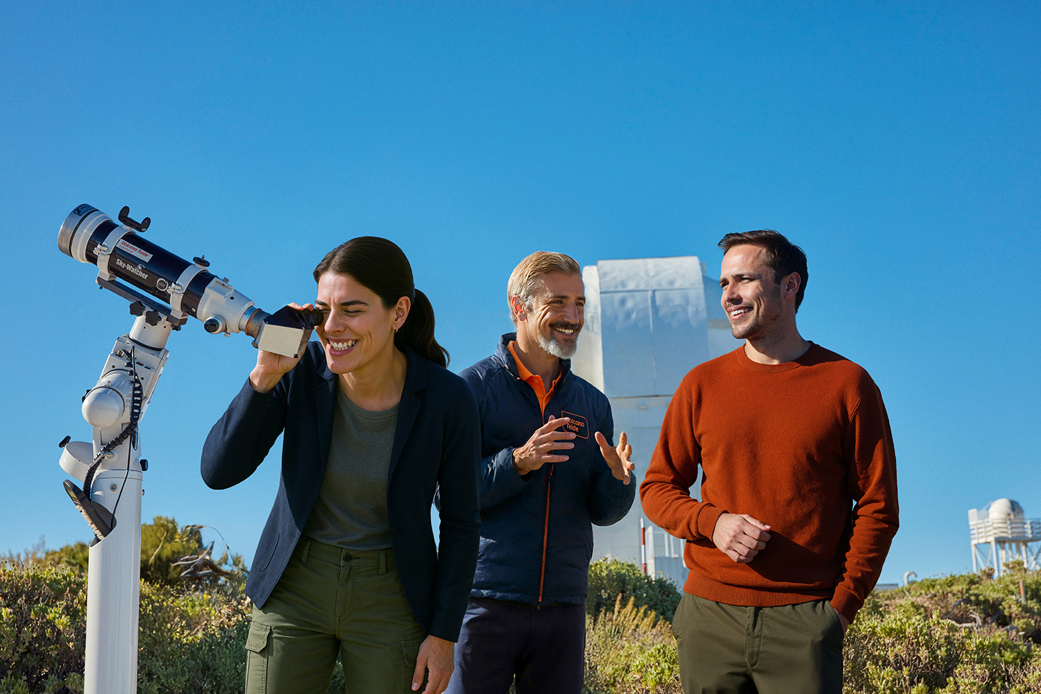 Visitors observing the Sun through portable solar telescopes